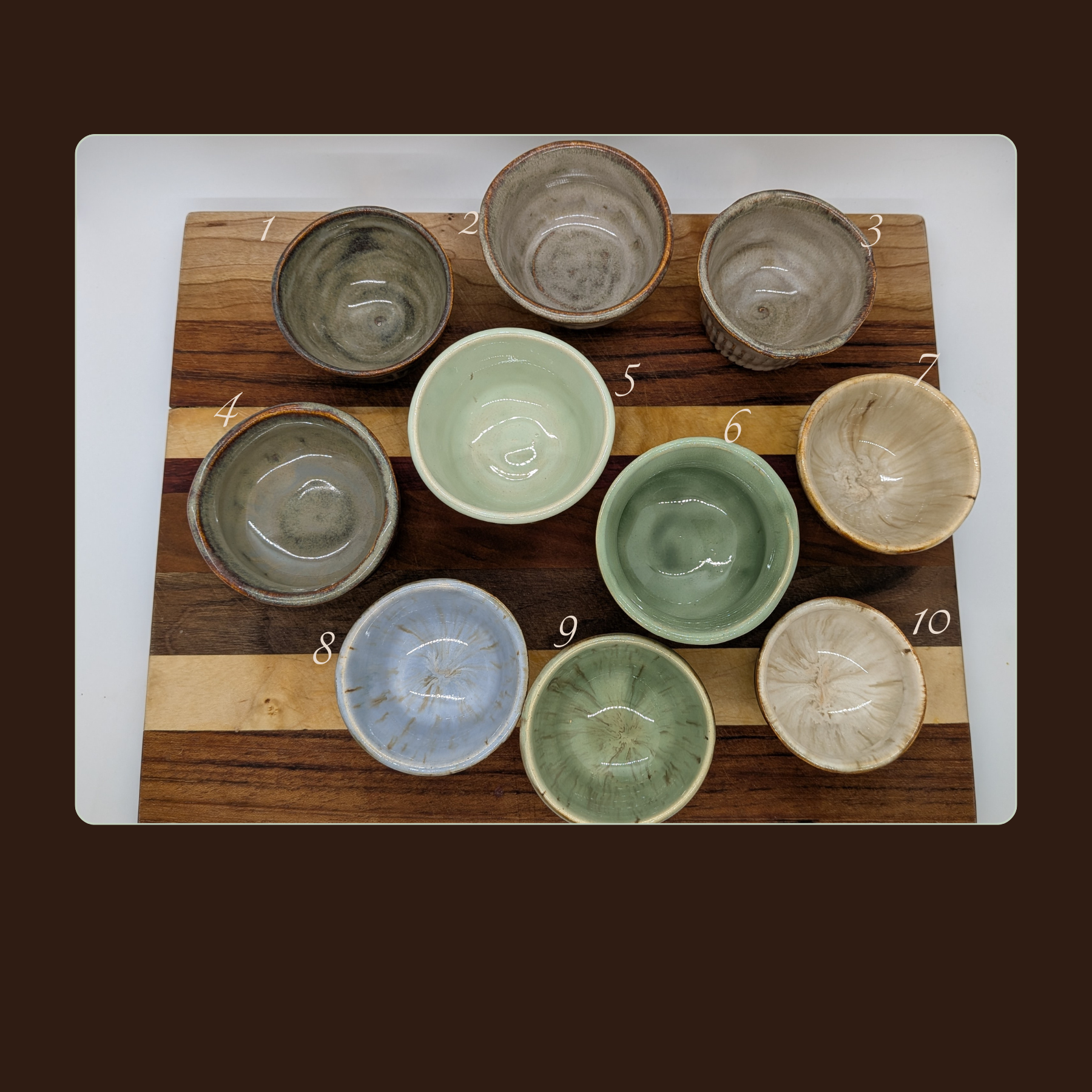 Mix & Match Shot Glasses - Each of these shot glasses is individually hand-thrown and therefore entirely unique. Each holds between 1 & 2 fluid oz. 

These stack nicely for storage, and would make a great housewarming or holiday gift! Choose a variety of interior colors so you'll always know whose is whose when you have guests. 

Priced at $10 each, or $35 for your choice of 4.

Would you like to have your shot glasses made into mini candles? I'm happy to add wax and a standard wick for an additional $2 per item. They are a delightful little addition to a kitchen or bath!

Let me know which ones you want, using the numbers in the first photo. 
#1, 4, 5, AND 6 are SOLD

 - 10